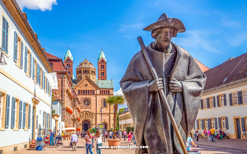 Statue of a pilgrim in front of Speyer Cathedral